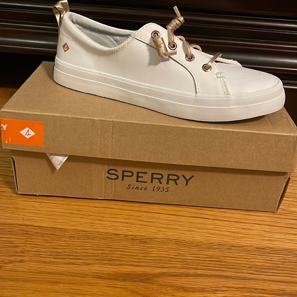White leather Sperry sneakers